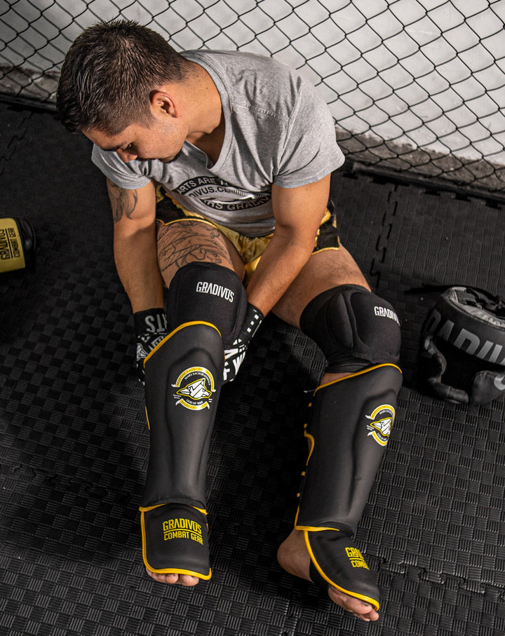 Canilleras Kick SparPro Kickboxing mma sambo muay thai k1 artes marciales mars gradivus combat gear deporte combate full contact pelea salud negro amarillo rodilleras cabezal vendas guantes boxeo